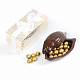 Какао боб из горького шоколада с драже "Фундук" в горьком шоколаде с декором золотого цвета
